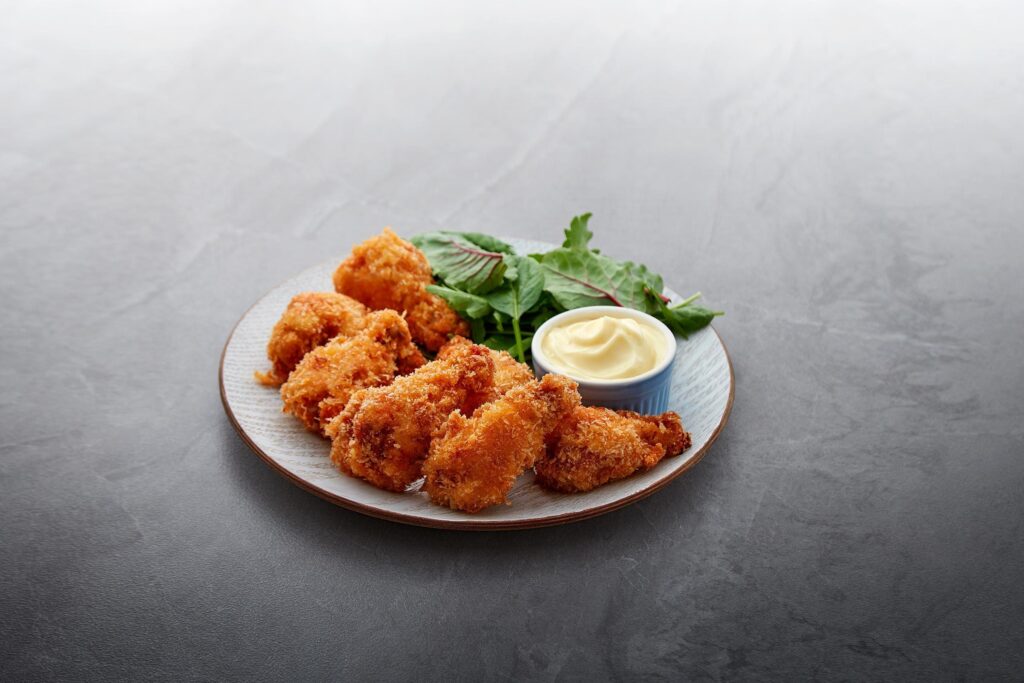 Ayam Bersalut Dengan Keju Dan Mayonis