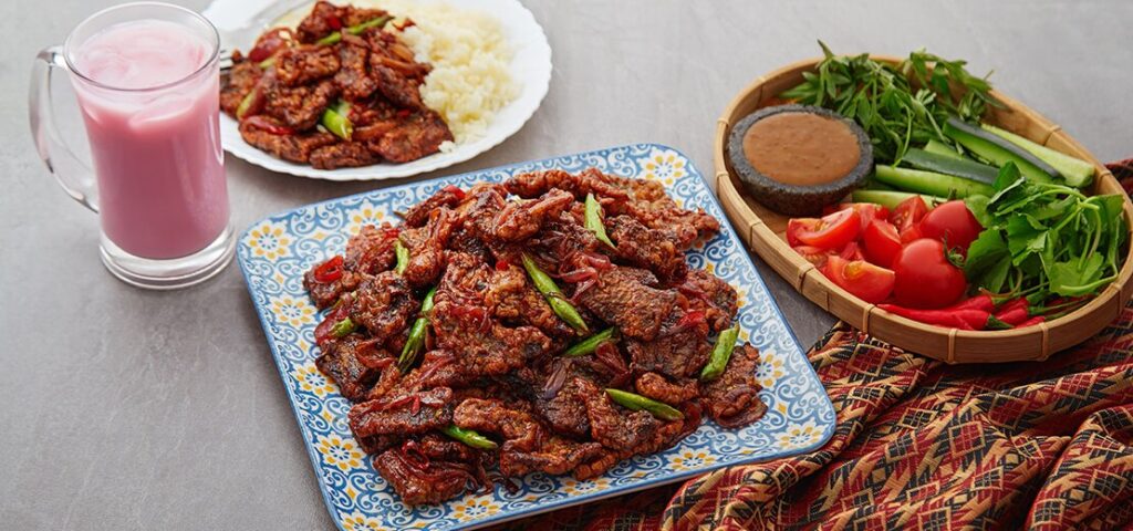 Plate of spicy sesame beef made with Hellmann's