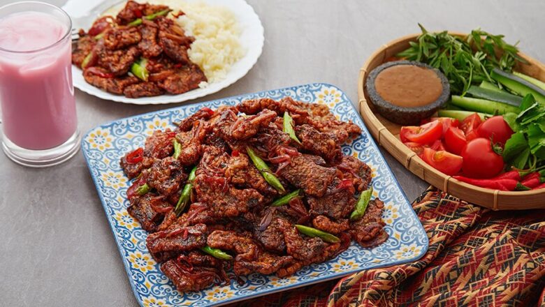Plate of spicy sesame beef made with Hellmann's